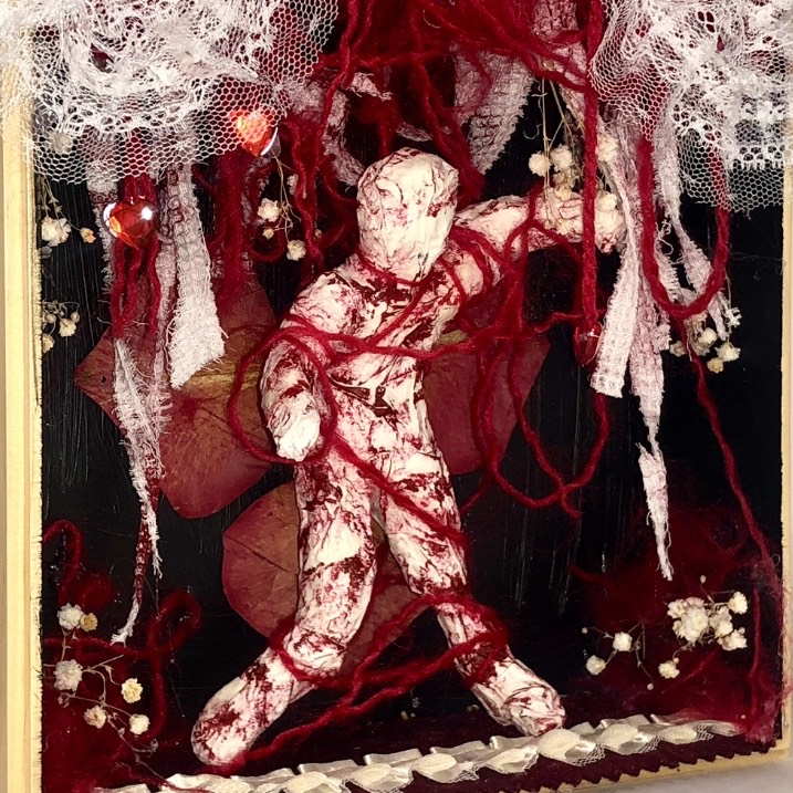 Blood splattered paper mache figure